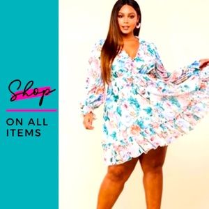 Cream floral baby doll dress w/long sleeves and side cut out details